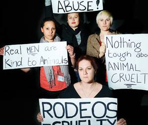 PROTEST:  (From left) Lucia Webster, Amy Johnson, Callie Redman (front) and Lily Denshire.