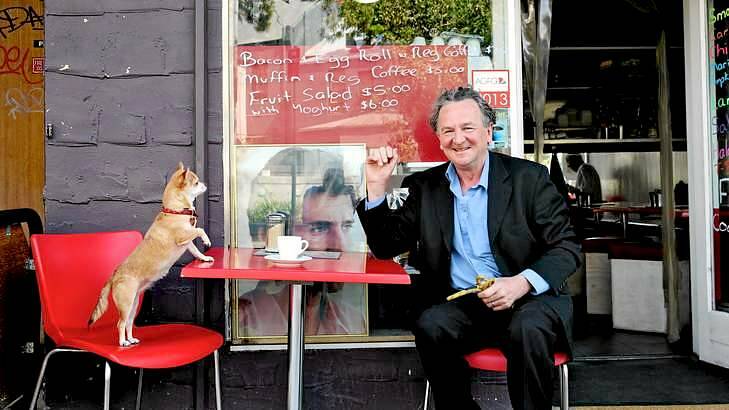 Satirical engagement: Louis Nowra, winner of the Patrick White Literary Award, having coffee in Kings Cross with his chihuahua Coco. Photo: Edwina Pickles