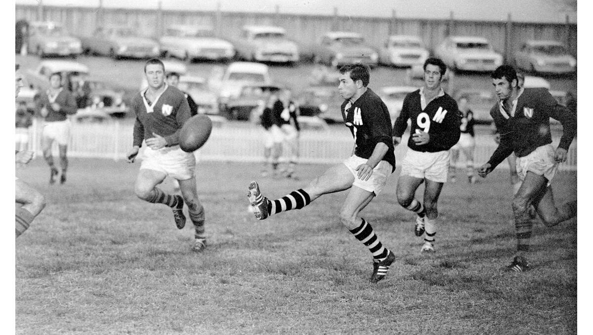 PICKER PRIDE: Brian Burke and Max McMahon, two Pickers greats, in action at the Sports Ground in the early ‘70s.