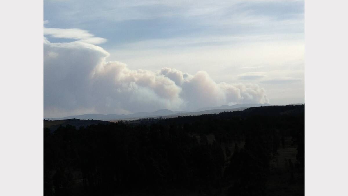 View of fire near Denman from Mount Owen north of Singleton, Thursday. Picture Jayden Lyons
