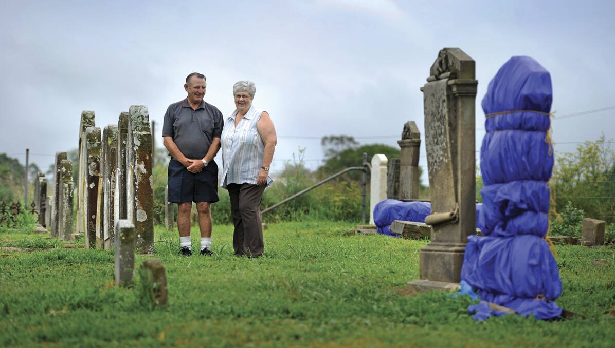 SHINING A LIGHT:  Ron and Ruth King at the Jewish cemetery in Louth Park.  
