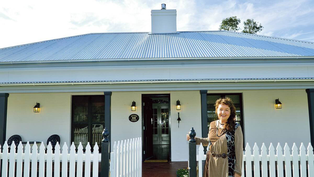 LEFT: Wendy Nye with her Victorian-style award-winning Morpeth home and, below, the now ­demolished property that inspired the new house’s design. 