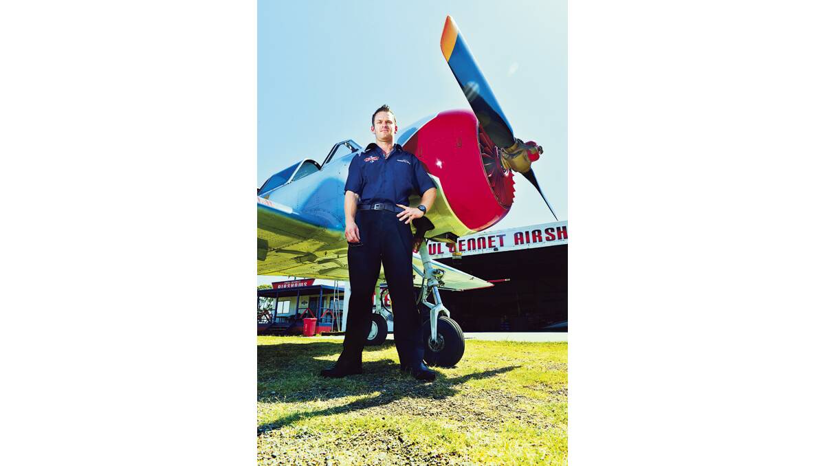 ON THE FLY:  Pilot Glenn Graham with the Yak, now  calling Maitland Aerodrome home.   