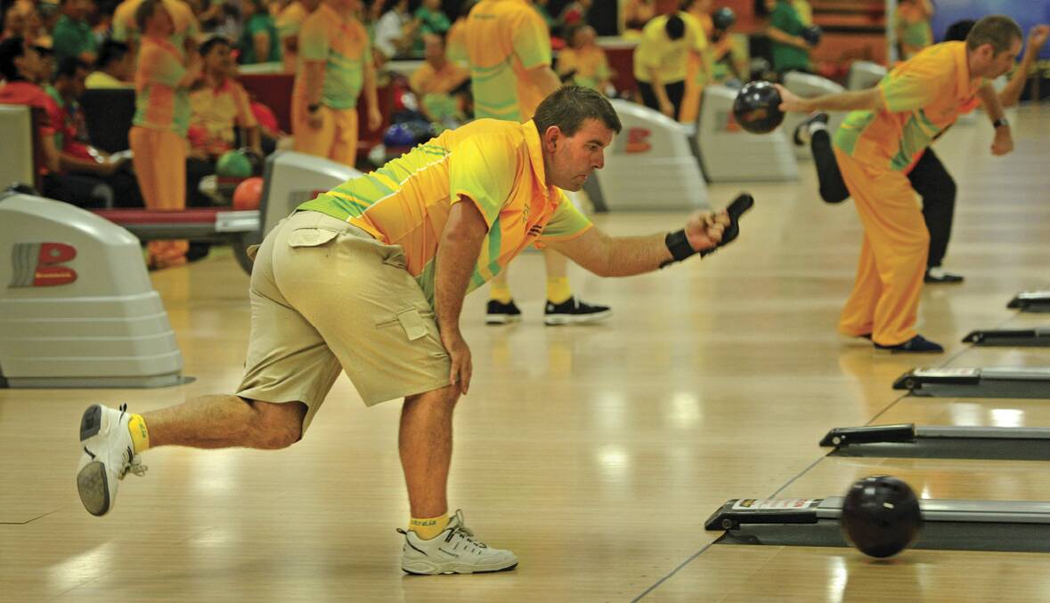 SPECIAL OLYMPICS: Australia’s Gregory Black sends down his bowl.