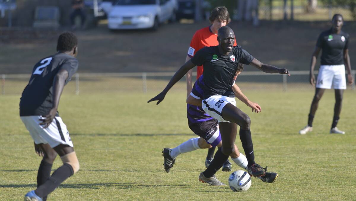 GRAND FINAL: Action from Beresfield's dramatic penalty shootout win against Hunter Simba on Saturday. 