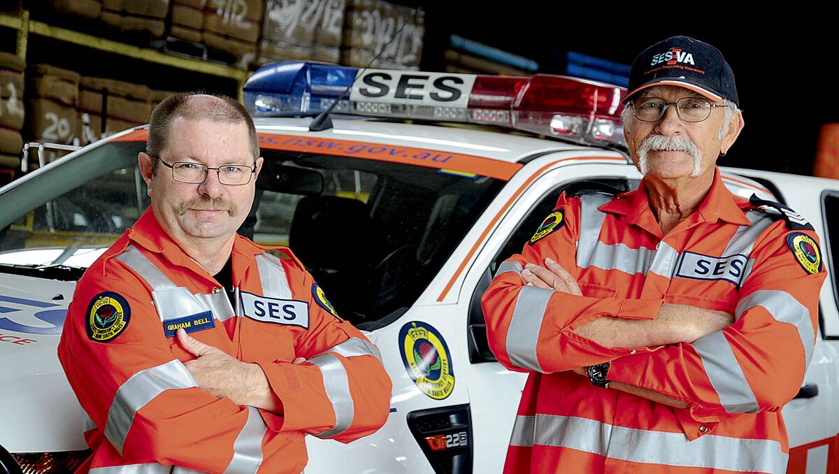 JOIN THE CAUSE: SES volunteers Graham Bell and Anatol Dangel.   	Picture by CATH BOWEN 121113CB247