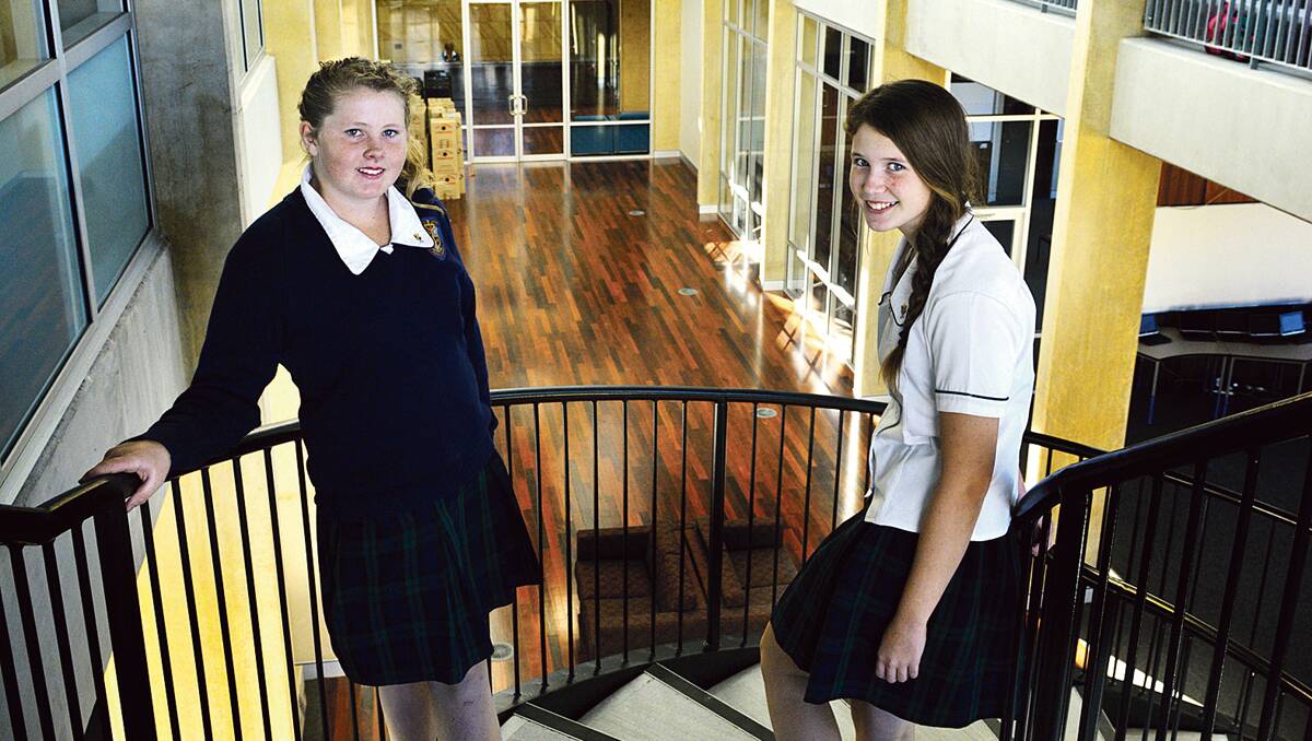 SHOWPIECE: Year 7 students Georgia Moore and Maddison Lachmund in the new building.   