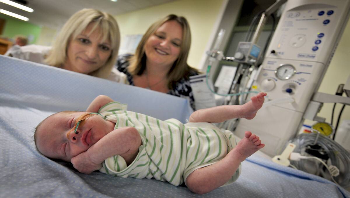 DESPERATE NEED:  Maitland emergency nurses Jane Bellamy and Jackie Searle with baby Harvey Brown who was born 10 weeks premature.  Picture by CATH BOWEN                         