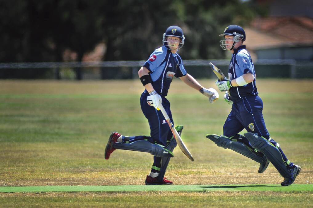 TRIPLE TON: Josh and Jarrod Moxey ­during their record stand last Saturday.  	 	Picture by  	MARINA NEIL