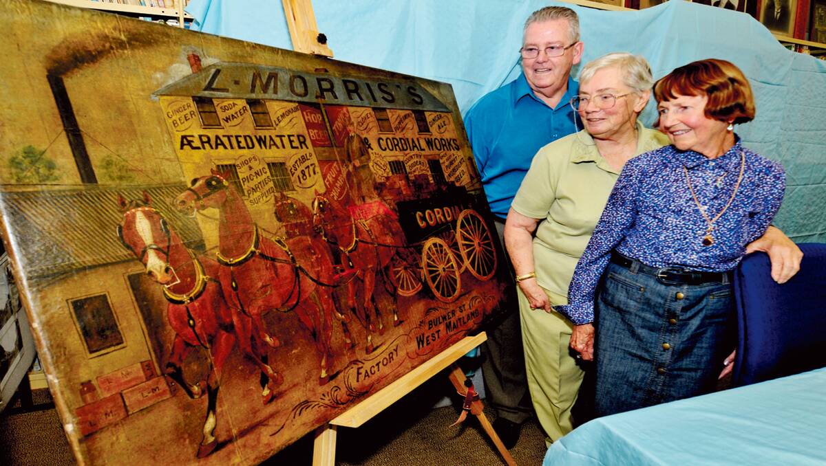 IMPRESSIVE:  Lewis Morris descendants Frank Morris, Beatrice Brooks and Judith Carmody with the restored artwork by Aland Watts.