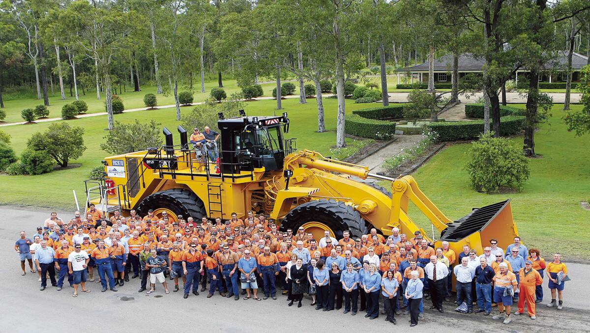 BIG: Bloomfield Group colliery workers and Four Mile engineers gathered at the company office grounds in East Maitland earlier this year for a barbecue to launch the latest big toy – the CAT 992K10.
