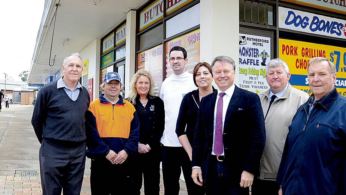 WIN FOR CITY:  Hunter MP Joel Fitzgibbon with (from left) Grant Booth of Rutherford Post Office, John Lynch Rutherford shopping centre graffiti buster, Heidi Avery of the Rutherford Family Medical Centre, Phillip Slater from Amcal Pharmacy, Sandie Berthold of SB’Z Hair Studio, Wayne Cone Maitland City Council executive manager strategic projects and councillor Henry Meskauskas.   