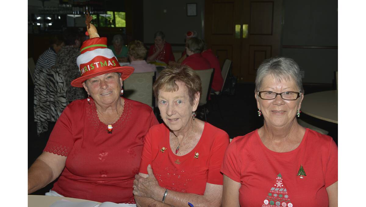 BOWLERS: Fay George and Heather Mills of Cessnock with Lorraine Small of Heddon Greta at the Hunter River District Women’s Bowling Association Christmas party.