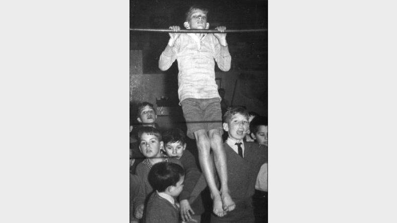 Chin ups: Fun and exercise have always been a big part of the attraction at the PCYC.
