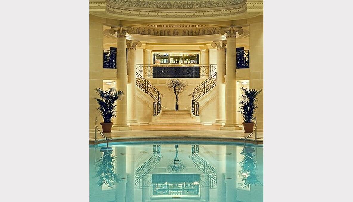 The pool at the Ritz Paris is an architectural feature with painted ceiling frescoes and neoclassical grandeur.