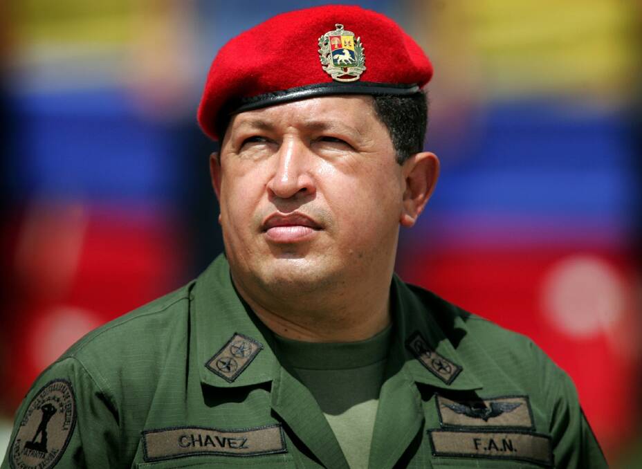 Venezuela's President Hugo Chavez wears an army uniform and the red beret of his parachute regiment while attending a military parade in Caracas in April, 2005. Photo: REUTERS/Jorge Silva
