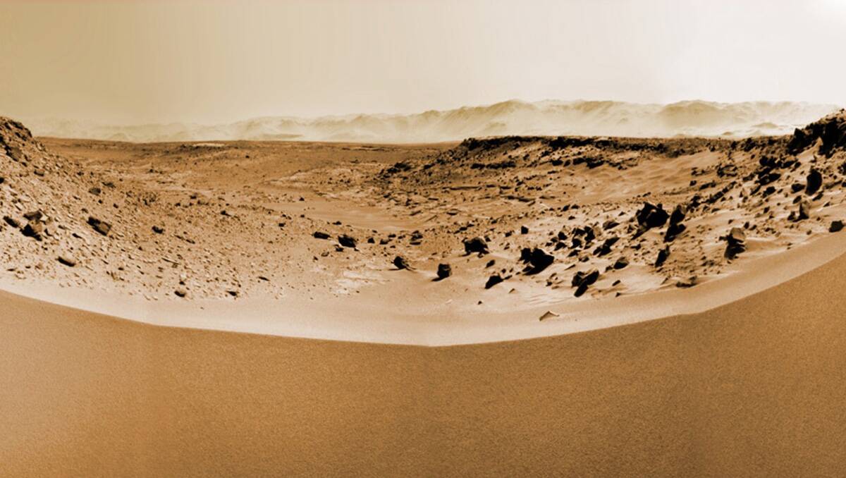 DINGO GAP: NASA’s Little Rover crosses a dune at Dingo Gap. 	Image courtesy of nasa/jpl