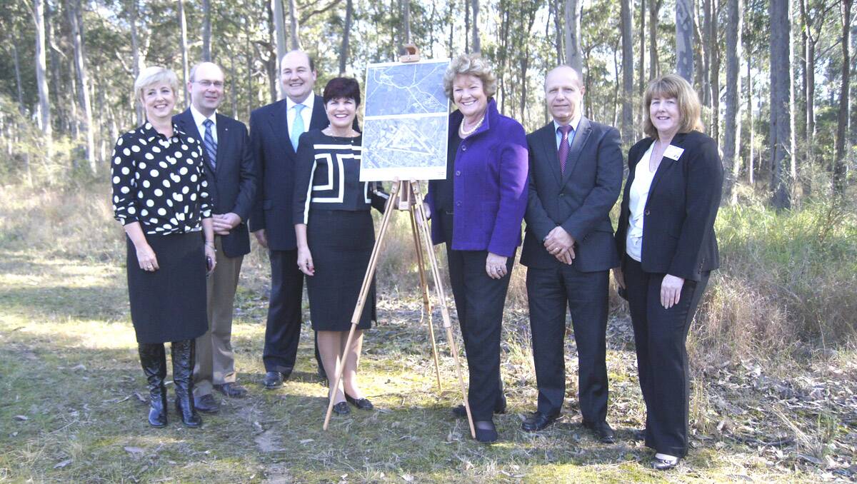 Health Infrastructure project director Kerry Ross, Health Infrastructure senior project director Eric Maranki, Health Infrastructure chief executive Sam Sangster, Maitland MP Robyn Parker, Health Minister Jillian Skinner, Hunter New England Health chief executive Michael DiRienzo, project leader and director of nursing and midwifery Karen Kelly at the site for the new hospital.