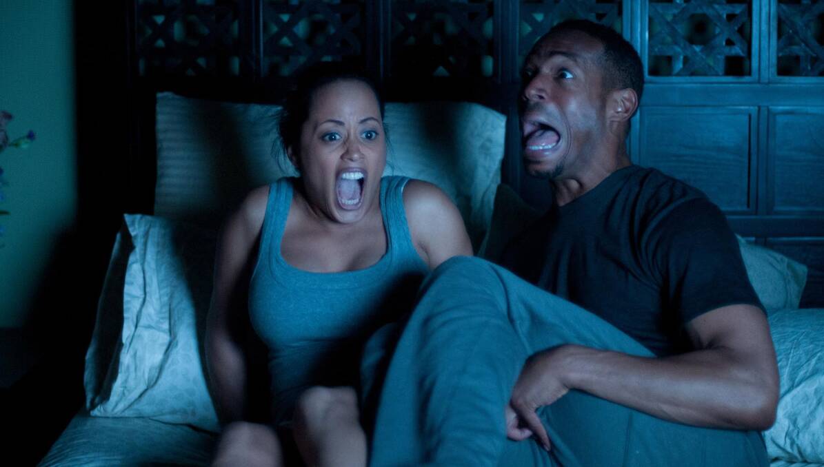 FRIGHT NIGHT: Essence Atkins and Marlon Wayans in A Haunted House.