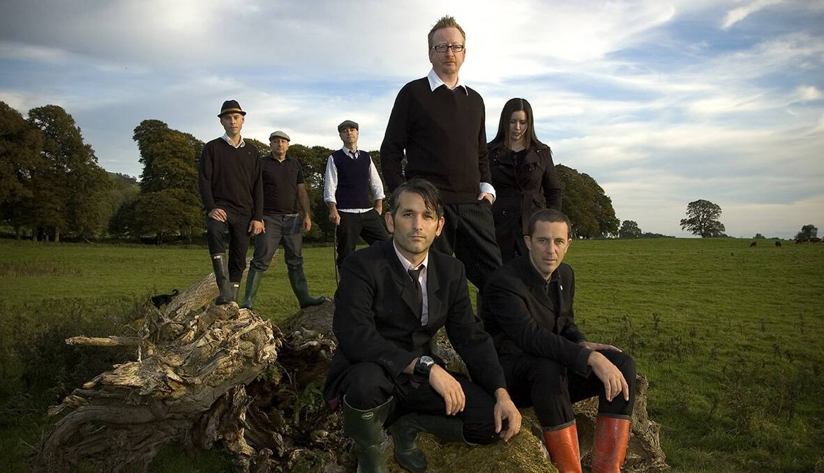 SPEED OF SOUND: Celtic-punk band Flogging Molly, with singer Dave King (standing centre) are playing Soundwave in Sydney on Sunday.