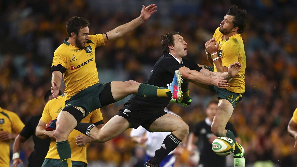 WHITE'S GREEN LIGHT: Nic White, far left, has been chosen in the Wallabies run-on side over Genia.