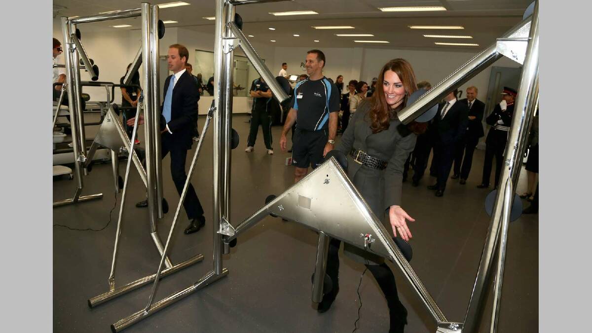 Prince William, Duke of Cambridge and Catherine, Duchess of Cambridge play a reaction game in the new gym during the official launch of The Football Association's National Football Centre at Burton-Upon-Trent in October 2012. Picture: Getty Images