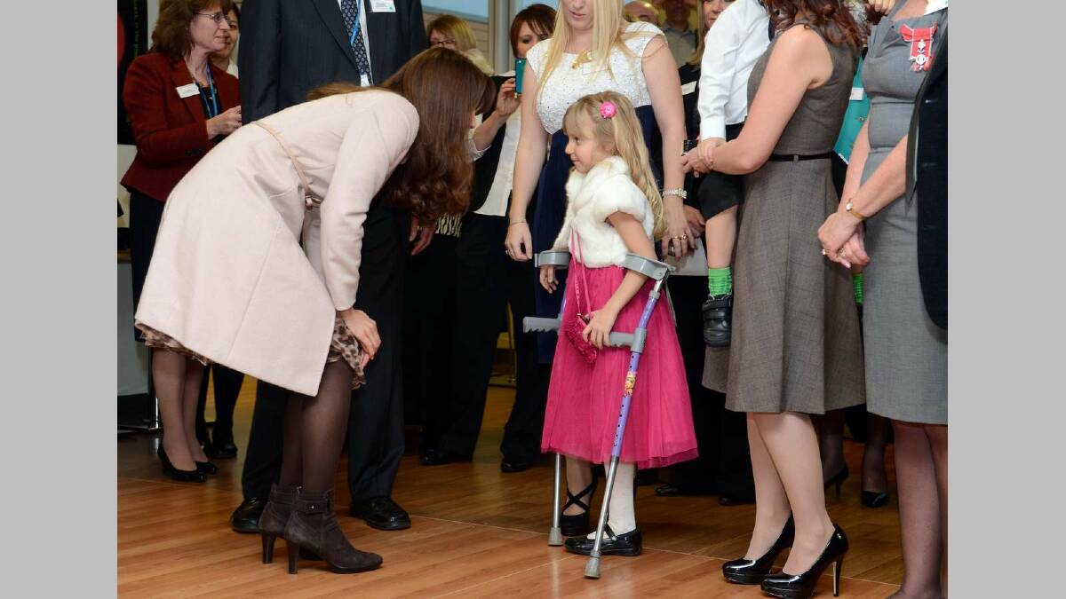 Catherine, Duchess of Cambridge meets Emma Henson, aged 7, during her visit to Peterborough City Hospital during an official visit to Peterborough on November 28, 2012. Picture: Getty Images