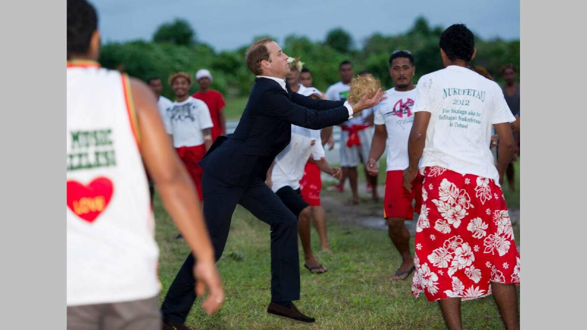 Prince William, Duke of Cambridge plays a Tulvaluian game called Te Ano on September 18, 2012 in Tuvalu.  Picture: Getty Images
