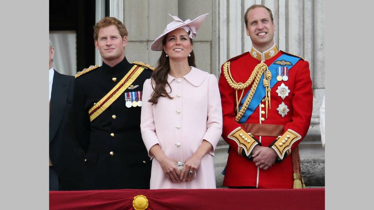 Prince Harry, Catherine, Duchess of Cambridge and Prince William, Duke of Cambridge on the balcony of Buckingham Palace during the annual Trooping the Colour Ceremony on June 15, 2013 in London, England. Picture: Getty Images