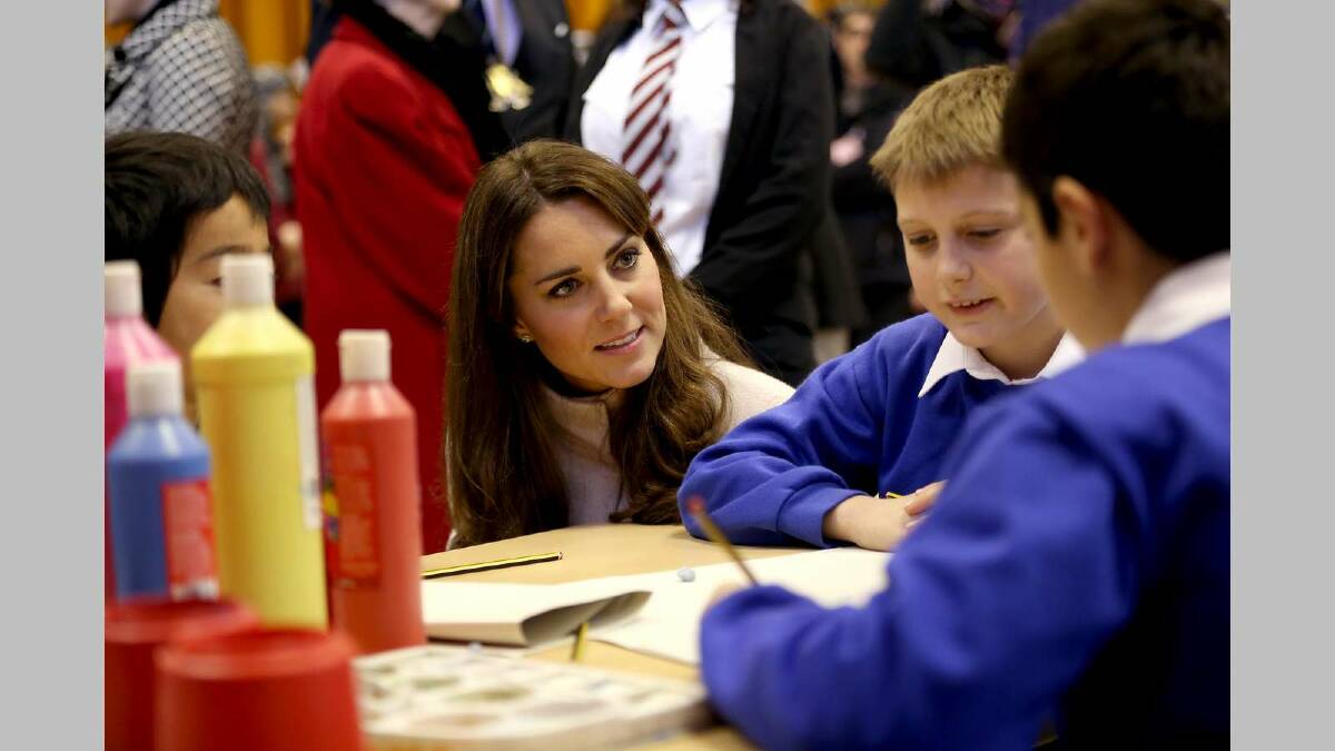 Catherine, Duchess of Cambridge meets children working on projects as she visits Manor School as she pays an official visit to Cambridge in November 2012. Picture: Getty Images