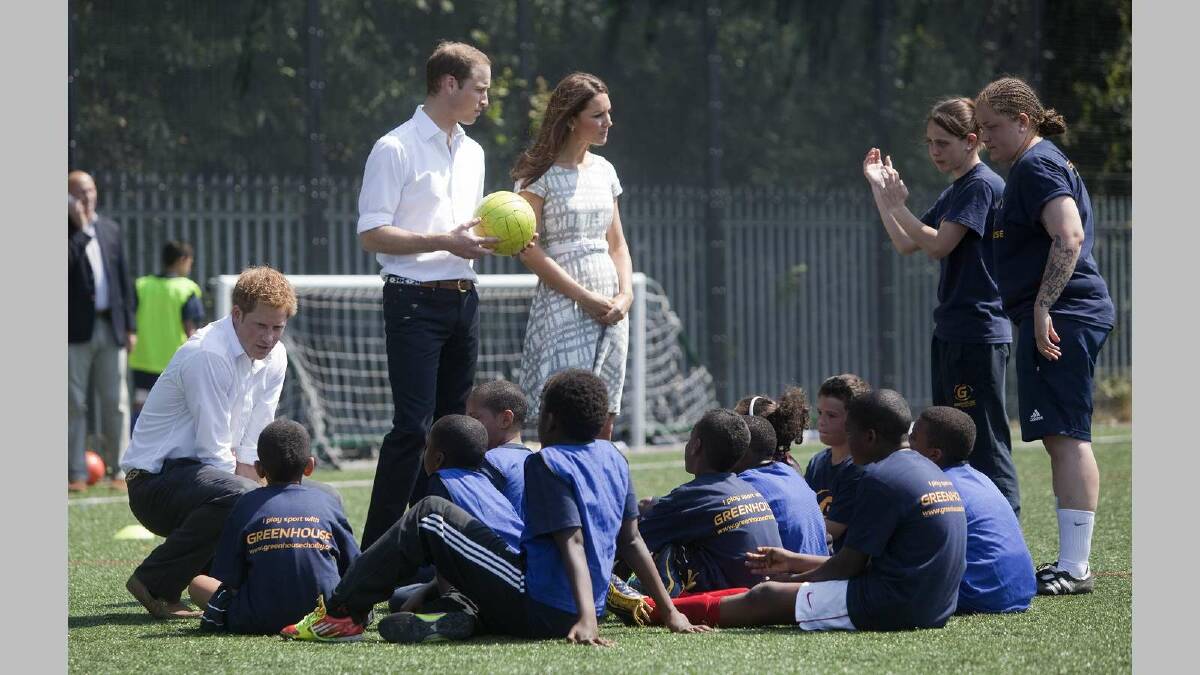 Prince William, Duke of Cambridge, Catherine, Duchess of Cambridge and Prince Harry visit Bacon's College in London in July 2012. Picture: Getty Images