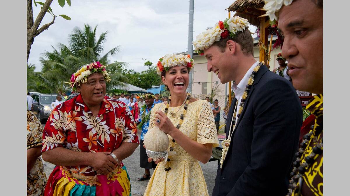 Prince William, Duke of Cambridge and Catherine, Duchess of Cambridge drink coconut milk from a tree planted by the Queen in 1982 on September 18, 2012 in Tuvalu. Picture: Getty Images