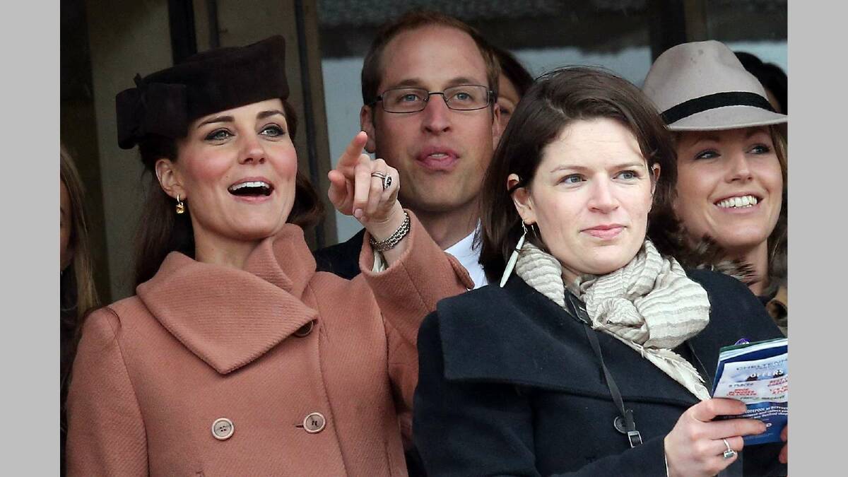 Catherine, Duchess of Cambridge and Prince William, Duke of Cambridge watch the races with other racegoers on Gold Cup Day at Cheltenham Racecourse in March. Picture: Getty Images