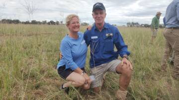 Steven and Cindy Scott, Glen Elgin Angus stud, Henty, are at a field day on their property in April checking the progress of one of their premier digit grass stands.