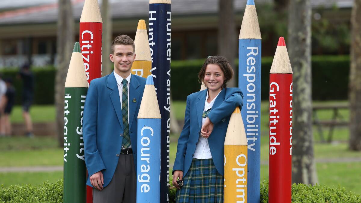 Sharp minds: Angus Rogers, 18, and Genevieve Janse van Rensburg, 17, after the HSC Chemistry exam at Hunter Valley Grammar School. Picture: Peter Lorimer