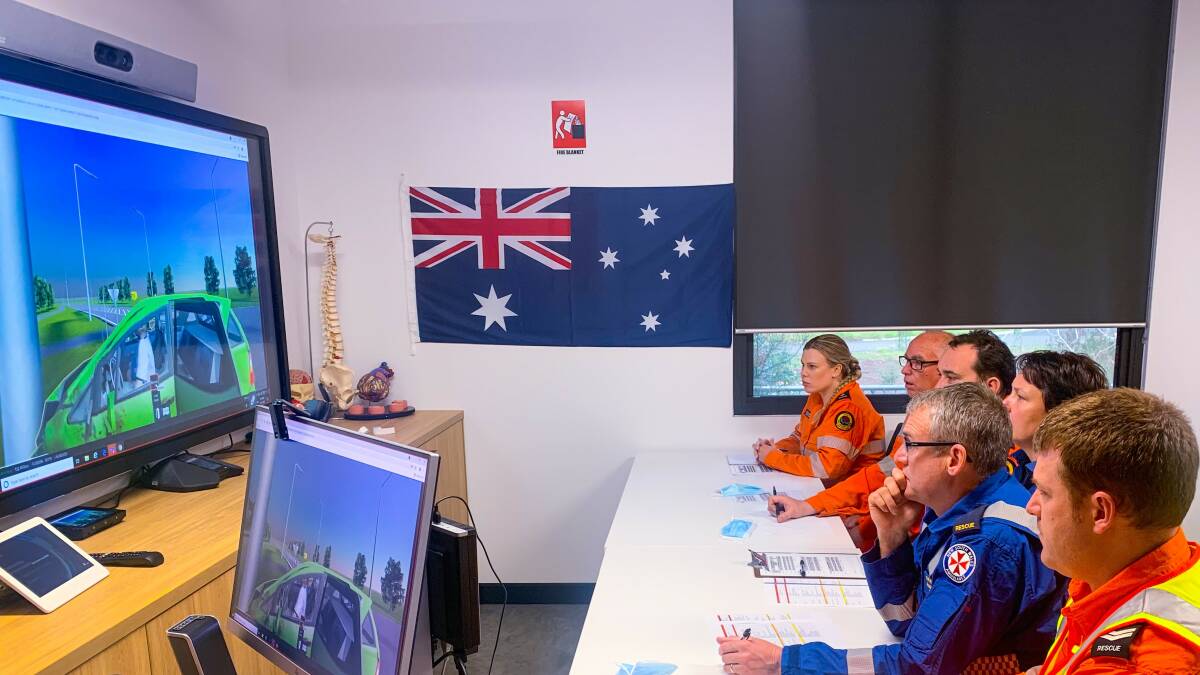 Virtual reality: The team made up of Port Stephens SES members Jamie Barnett, David Douglas, Ken Hepplewhite and Alysha Springett and NSW Ambulance members Jane Huebner (Singleton) and Steven Young (Rutherford) at the World Rescue Challenge. Picture: Supplied.