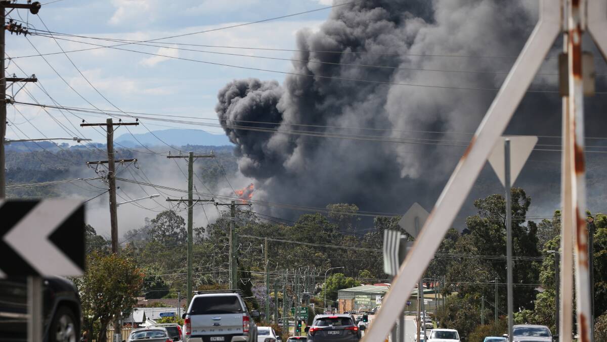 Ablaze: Smoke from the Weston Aluminium fire blanketed Kurri Kurri on Sunday. Picture: Peter Lorimer
