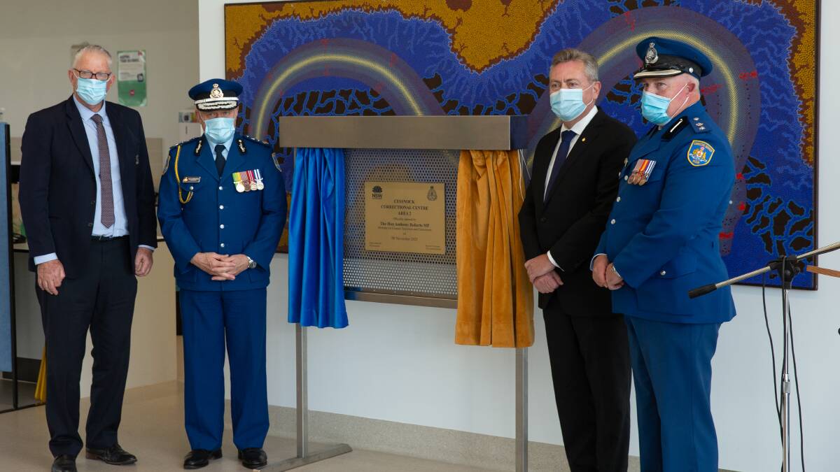Official opening: Cessnock Mayor Bob Pynsent, Acting Commissioner Kevin Corcoran, Minister Anthony Roberts and Acting Governor at the Cessnock Correctional Centre Dale Ashcroft unveil the facility's new plaque Picture: Marina Neil