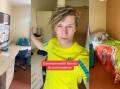 Australian diver Sam Fricker (centre) gave a tour of his room, which included a bed (right), desk (left) as well as a cupboard and shower. Photo: Sam Fricker via TikTok