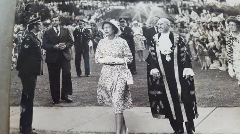 A ROYAL VISIT: John Hakes (left) was on duty in Civic Park when Queen Elizabeth II visited in 1977. They were given instructions to not make eye contact with HRH, or to approach her. Unfortunately for Mr Hakes, HRH decided to head straight towards him, and he had to quickly back pedal to avoid her.
