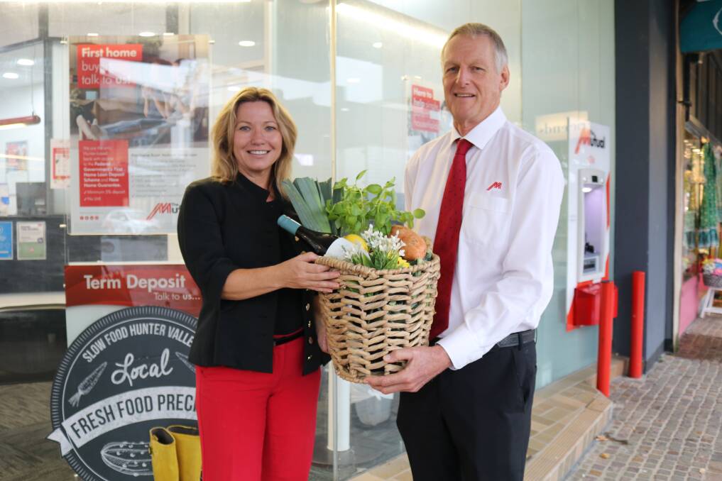 PRESENTING PARTNERS: Maitland City Council events officer, Janine Chandler, with The Mutual Bank chief executive officer Geoff Seccombe at The Levee, where Maitland Taste will be held in May. Picture: Supplied.