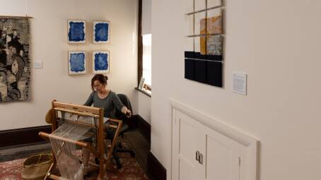 Textile artist Ellen Howell at the loom in the Brough House Fibre Makers Space. Picture by Jonathan Carroll
