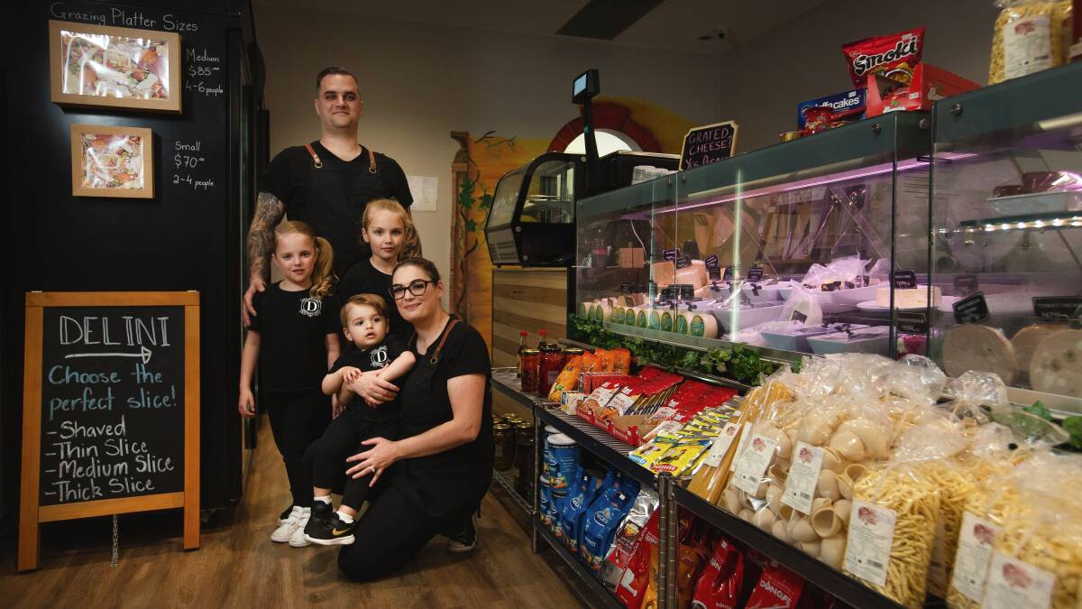 FAMILY FIRST: Ashlee and Ben Milinkovic photographed with their children Lilijana (seven), Adelina (six) and Dejan (two). Picture: Marina Neil.