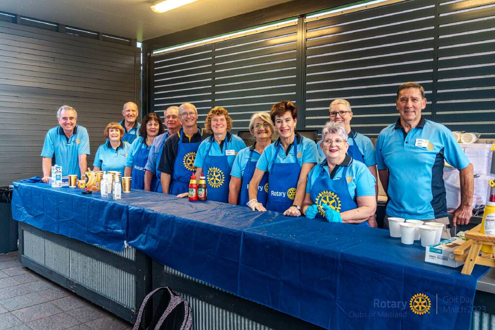 Rotarians on barbecue duty at the 2023 Rotary Golf Day for Maitland HealthStays. Picture supplied