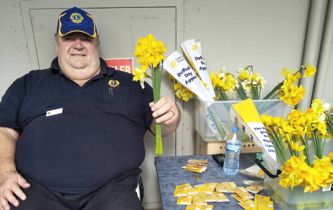 DEDICATION: Graham raising funds for the Cancer Council's Daffodil Day. Picture: Supplied. 