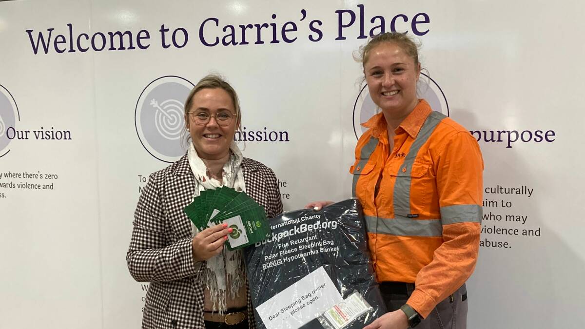 Carrie's Place events and fundraising coordinator Rebekah Sadlier and ARTC Rutherford area manager maintenance services Tara Andrews. Picture supplied
