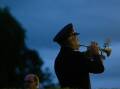 A bugler at the 2024 Maitland Park Anzac Day dawn service. Picture by Jonathan Carroll