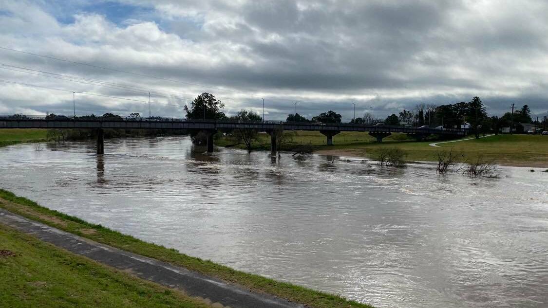RISING: The Hunter River at Belmore Bridge, Maitland at 10.10am Monday, July 4, which is likely to peak at seven metres. Picture: Michael Hartshorn.