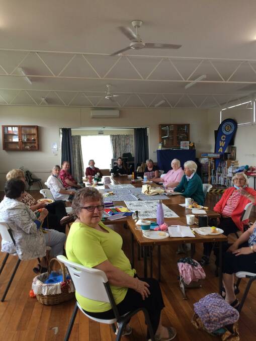 GETTING FESTIVE: The East Maitland CWA ladies have been busy making handicrafts which will be sold at Saturday's market. Pictures: Annette Hardes.
