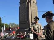 A member of the Australian Army catafalque party watches over the East Maitland War Memorial on Anzac Day 2023. Picture by Chloe Coleman.